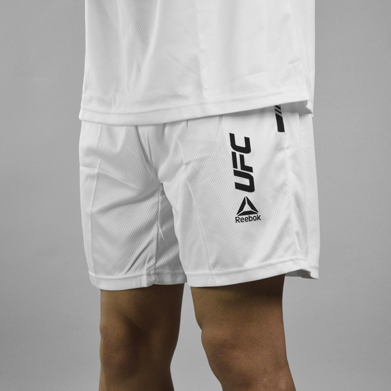 ست رکابی و شلوارک ورزشی مردانه ریباک مدل DS-UFC 3080 سفید سه رخ ست رکابی و شلوارک ورزشی مردانه ریباک مدل DS-UFC 3080 سفید سه رخ