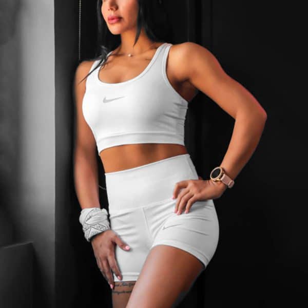 ست نیم تنه و شلوارک ورزشی زنانه نایک مدل SRN-1M945 سفید لایف استایل