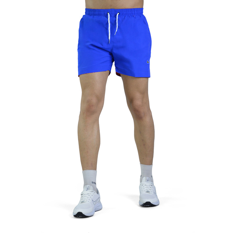 مایو شنا مردانه لاگوست مدل L01 آبی تیره